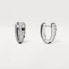 Μικρά σκουλαρίκια Panthere Diamond, λευκόχρυσο | Cartier Us Μικρά σκουλαρίκια Panthere Diamond, λευκόχρυσο | Cartier Us