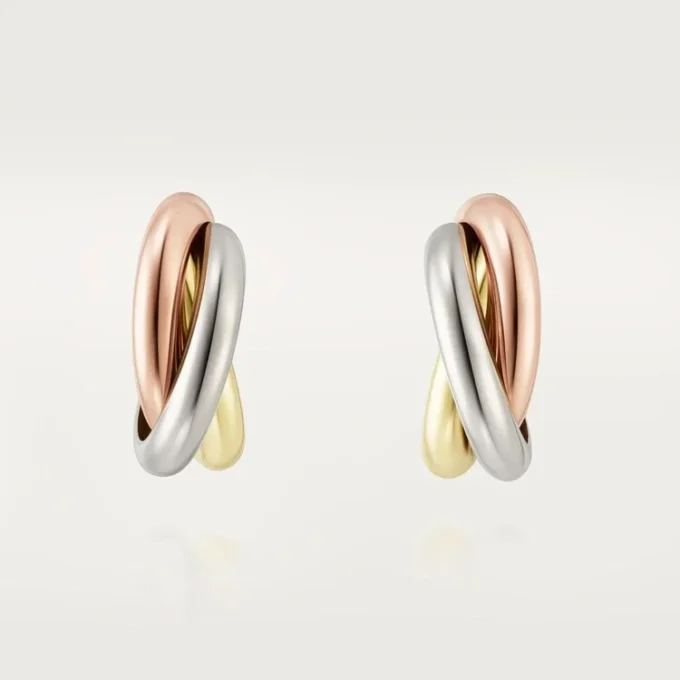 Σκουλαρίκια Trinity Hoop σε τρίχρωμο χρυσό | Cartier Us Σκουλαρίκια Trinity Hoop σε τρίχρωμο χρυσό | Cartier Us