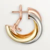 Σκουλαρίκια Trinity Hoop σε τρίχρωμο χρυσό | Cartier Us Σκουλαρίκια Trinity Hoop σε τρίχρωμο χρυσό | Cartier Us