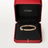 Βραχιόλι Panthere De Cartier, μικρό μοντέλο, με ημι-παβέ Βραχιόλι Panthere De Cartier, μικρό μοντέλο, με ημι-παβέ